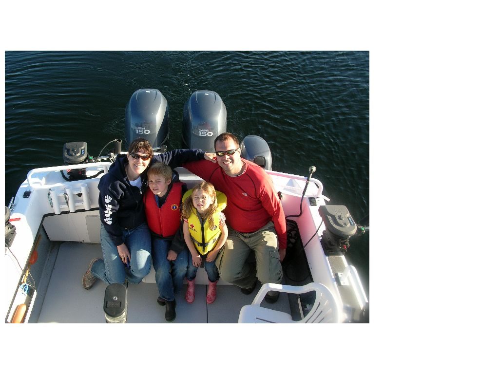 Family aboard a charter boat off Masset