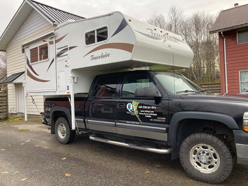 Travelaire slide-out camper on a Chevy Silverado at the house
